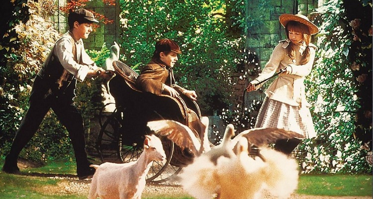Movie still of Dickon, Colin, and Mary from the 1993 adaptation of The Secret Garden.