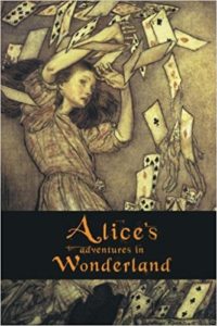 Alice and Wonderland book cover - Alice dodging playing cards as they swarm around her
