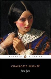 Book cover for Jane Eyre by Charlotte Bronte - Victorian woman braiding her hair