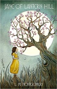 Jane of Lantern Hill book cover - girl in yellow dress looking at a flowering tree against a full moon