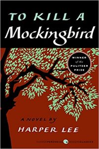 To Kill a Mockingbird book cover - black and green tree on a red background.