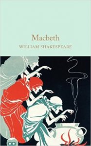 Macbeth book cover - three witches bending over a cauldron