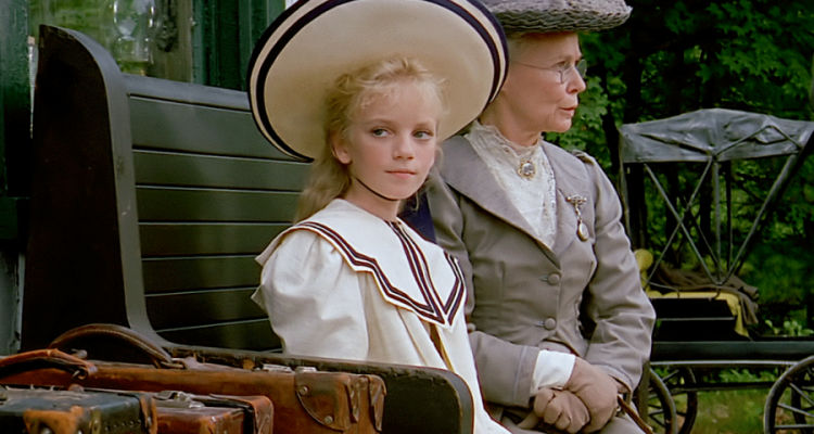 Still from Road to Avonlea TV series - Sarah Stanley and her nannie sitting at the train station