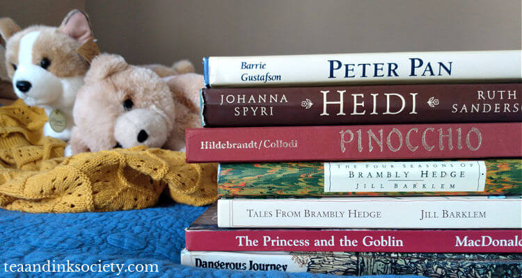 Stack of hardcover family read-aloud books, with stuffed animals in the background
